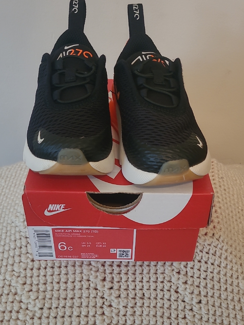 Nike Air Max 270 Black Sneakers with White Soles and Orange Accents
